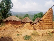 Because so many men have had to leave to find work, many of the buildings in Gidan Musa are not being maintained. Photo by Fraser Macdonald